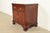 A beautiful Georgian or Chippendale style nightstand or end table By Baker Furniture USA, Circa 1980s Carved mahogany,...