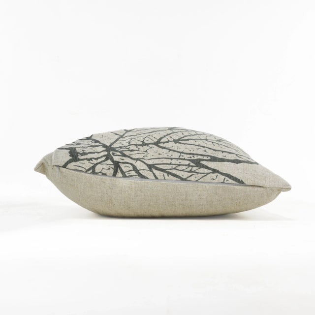 Bring nature indoors with this charming pillow featuring a detailed leaf pattern in muted earth tones. The subtle design...
