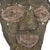 This figure has a strongly defined body and the well-known Songye jutting chin and geometric nose, with the eyes...