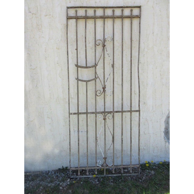 A piece of architectural salvage. Heavy and sturdy. Piece does show signs of age related wear including rust, flaking...