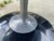 The Vintage Mid Century Modern Smoked Glass Chromcraft Oval Tulip Table is a stylish and elegant dining set perfect for...