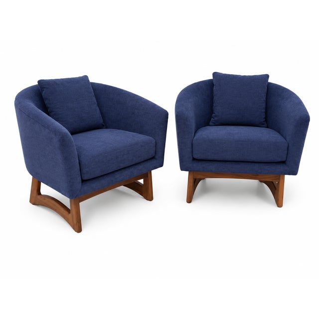 Mid-Century Club chairs excude mid-century style. The chairs are done in a rich blue chenille. A pillow, covered in the...