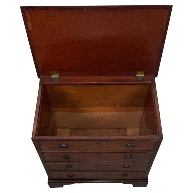 A highly unusual 18th-century English storage chest, finely crafted from mahogany and ingeniously designed to give the...