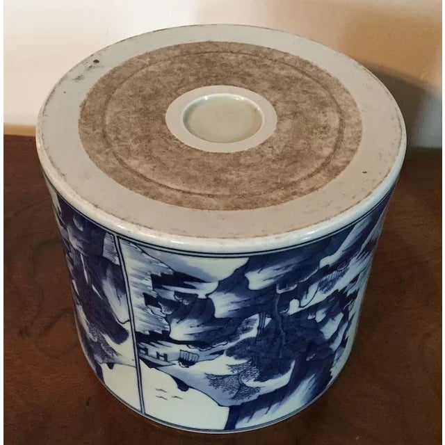 Large Chinese porcelain brush pot with Kangxi landscape and harbor scenes in blue glaze on a white ground - early 20th...