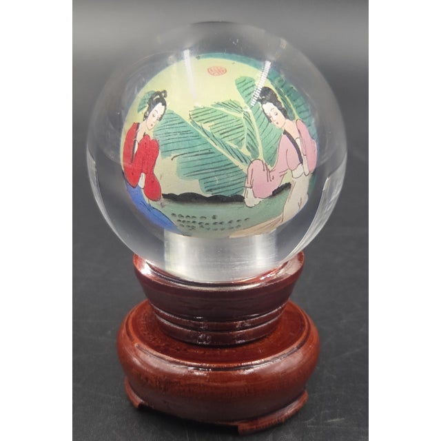 This is a one of a kind Vintage reverse painted Chinese globe on rotating stand. The glass orb sits on top of its manual...