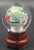 This is a one of a kind Vintage reverse painted Chinese globe on rotating stand. The glass orb sits on top of its manual...