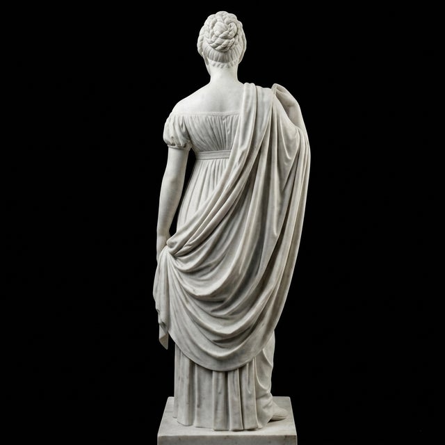 The Caroline Amalie sculpture embodies the elegance and poise of classical portraiture. Her graceful silhouette and...