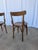 Vintage wooden dining chairs were made in Former Yugoslavia during the 1970s. Crafted entirely from solid wood, they...