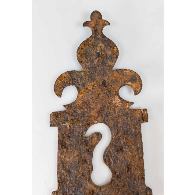We are selling this great wrought iron escutcheon cover. This plate is probably American or European, 17th or 18th century...