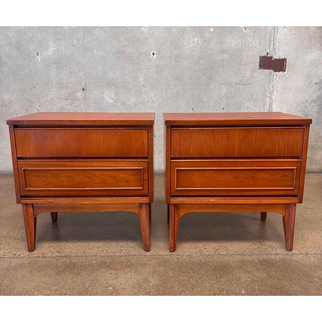 Vintage MCM walnut nightstands, these have 2 drawers . Great for storage bedside