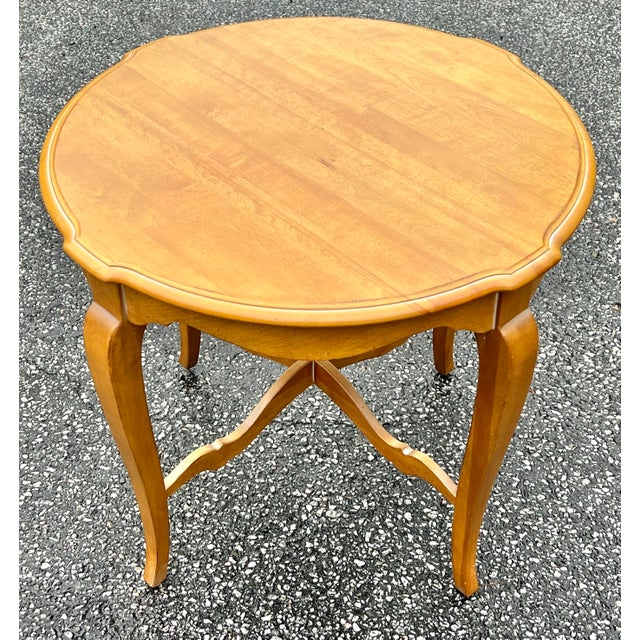 Solid maple and birch side table by Ethan Allen from their country French collection. If you are matching other Ethan...