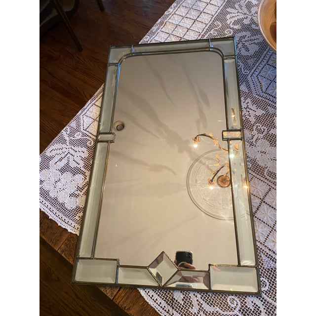 Post modern brass and beveled glass geometric mirror. This wall mirror is in the art deco style taking from Regency or...