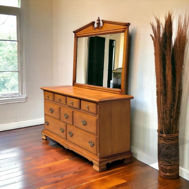 Vintage Ethan Allen Early American dresser with matching mirror, crafted in solid maple and birch with warm traditional...