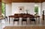 Danish modern expanding rosewood dining table designed by Harry Ostergaard for A/S Randers Mobelfabrik and imported by...