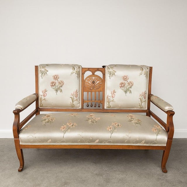 This piece brings a romantic blend of craftsmanship and charm. Hand-carved from rich walnut, its sculpted frame showcases...