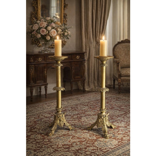 An exclusive pair of monumental liturgical candelabra (candlesticks) in solid bronze, dating back to the late 19th...