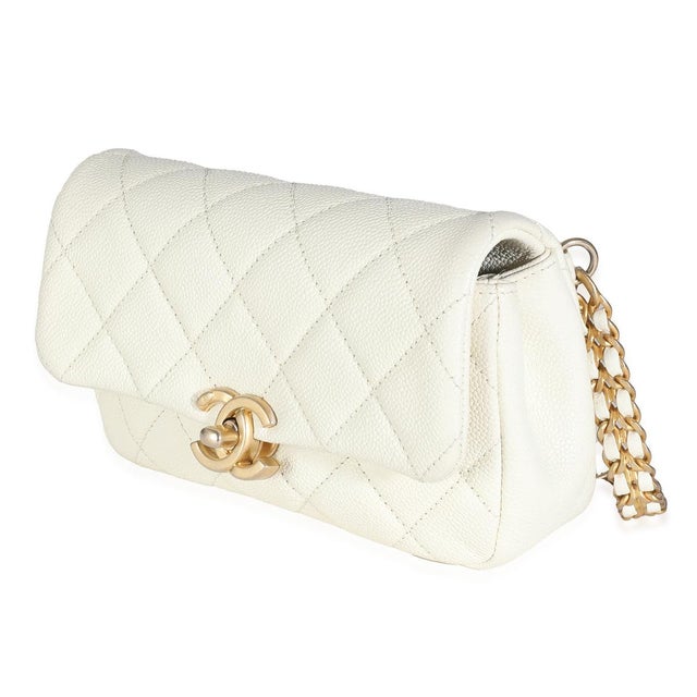 Item #: 138855 Features Interior: One slip pocket Dimensions: 7.25 x 4.25 x 1.8 in Handbag Closure Type: Turnlock Strap...