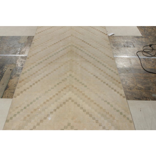 A delicious vintage 5x10 Art Deco rug originating from Turkey circa 1960-1970, joining Rug & Kilim’s Mid-Century Pasha...