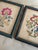 A charming pair of vintage crewel embroidery panels, beautifully framed in soft blue wood frames with subtle gold trim....