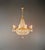 An elegant oval crystal chandelier with balanced proportions and refined detailing. The elongated shape makes it...