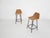 About this item Black metal bar stools with rattan seating. The frame has been repainted, the rattan is in good condition...