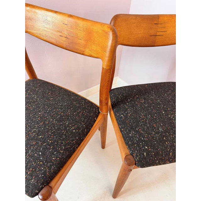 The two chairs are sold as a set. Johannes Andersen (1903-1991) was a Danish furniture designer and cabinetmaker known for...