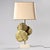 Guadeloupe table lamp, made by Maison Charles in France around 1970. Resting on a cream lacquered metal base, it features...