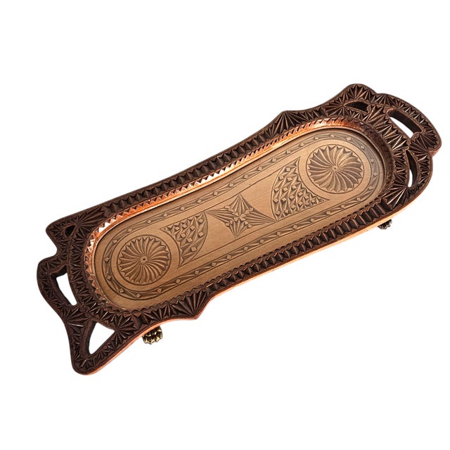 This vintage hand carved wood tray from the Netherlands. The carving is very fine and masterfully executed. It has brass...