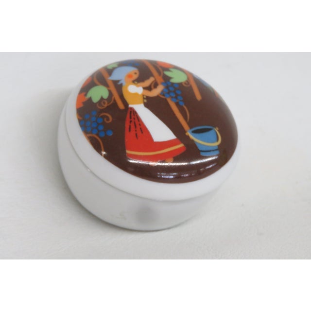 This lovely round Trinket Box / Jar is made of porcelain with a removable lid. This darling miniature container features a...