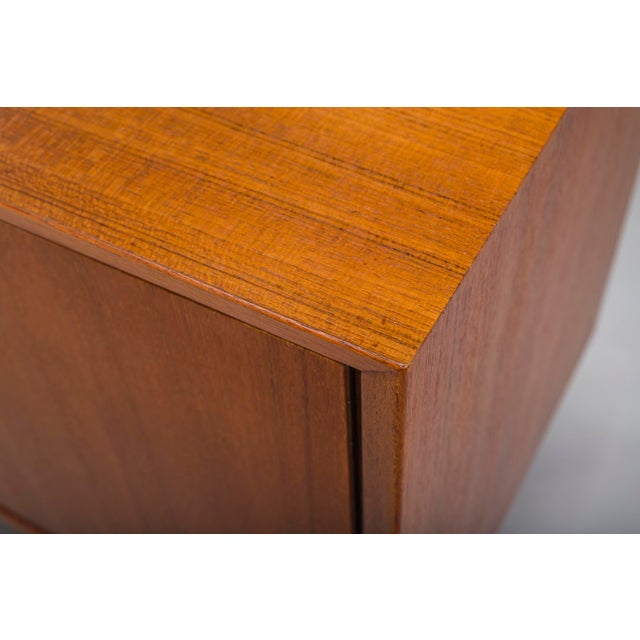 Elegant Mid-Century teak sideboard produced by Winrich Kreh Möbelwerkstätten in Germany during the 1960s. Featuring clean...