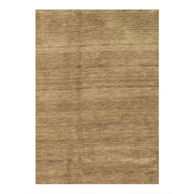 Gabbeh rugs are made by the nomadic Qashqai tribes of southern region. They are rough cut and long piled rugs of rich...