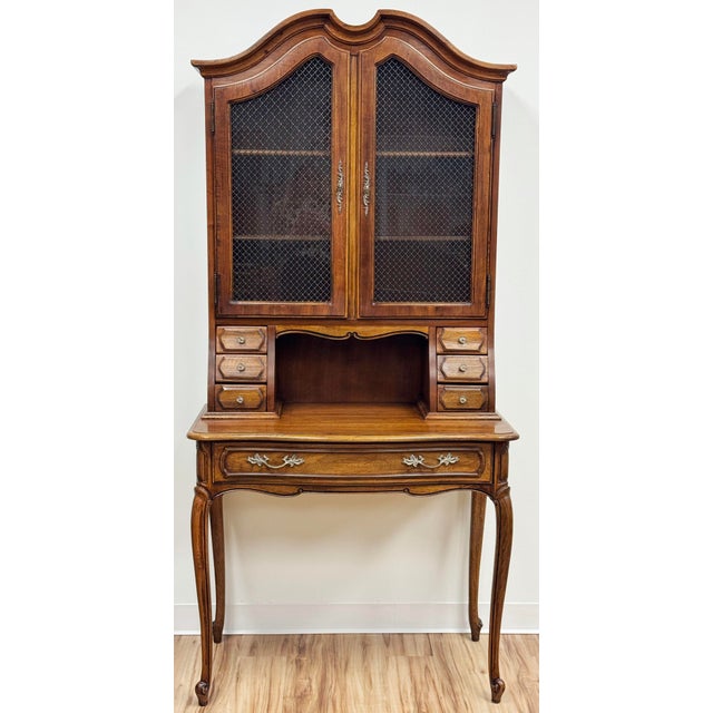 Vintage Thomasville French Provincial Secretary desk from the Camille Collection. Features two arched doors up top with...