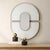 The Encase Oval Mirror Features A Striking Design With Two Semicircular Sections Of White Glass, Each Encased In A...