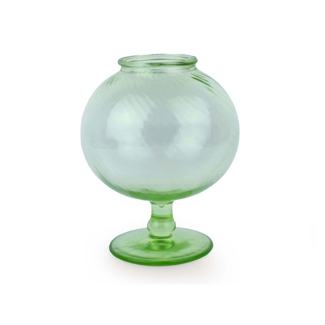 A luminous example of early 20th‑century glasswork, this ivy‑ball‑inspired leech‑bowl–style uranium glass vase brings...