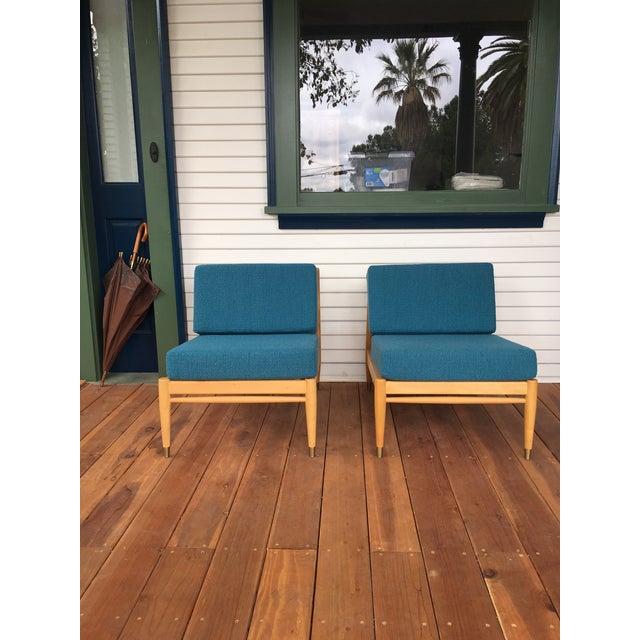 This is a great pair of DUX chairs designed by Folke Ohlsson. They are is excellent restored condition. The wooden frames...