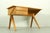 Bring a piece of Dutch design history into your workspace with this iconic model EB02 writing desk designed in 1952 by...