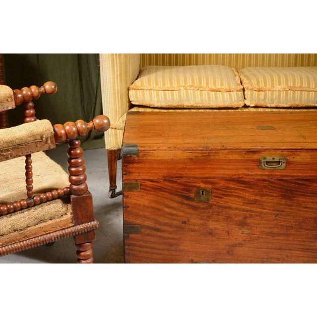 A large camphor wood chest, with double lock, of exceptional colour. These make excellent coffee tables or sit happily at...