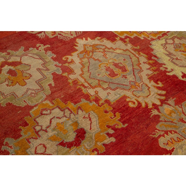 Turkish Oushak Antique Wool Rug Handmade in Red Featuring a Floral Design For Sale - Image 11 of 11