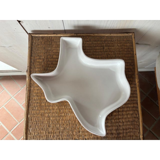 Texas-shaped serving tray by Frankoma! Made of terra cotta ceramic coated in a simple white glaze, it's great for a...