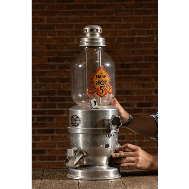 c. 1930s-1940s; Roy Stringer Co., Ltd. - San Marino, California A rare aluminum and glass countertop peanut warmer and...