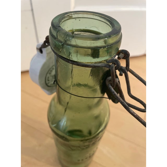 Ceramic French Antique l'Ideale Bottle With Porcelain Top For Sale - Image 7 of 12