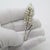 A refined vintage miniature depicting a life size wheat ear, handmade in Continental Silver (800/000) in Italy between the...