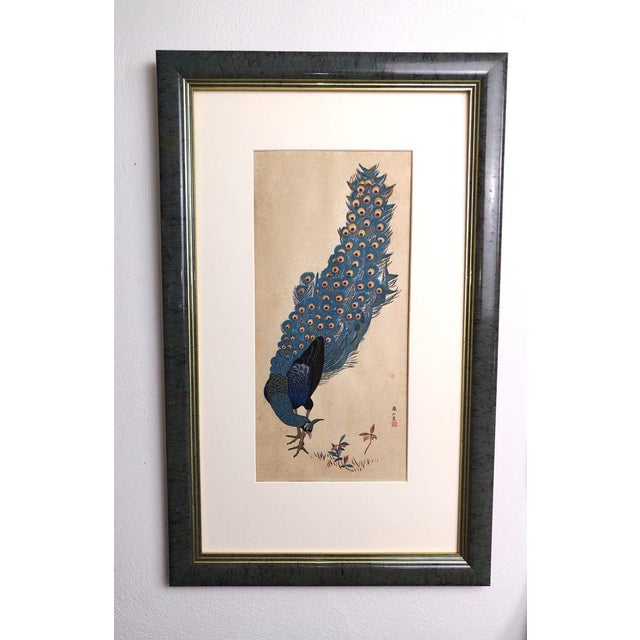 Hand-colored woodblock print of a peacock by Mori Tetsuzan, publisher of The Simbi Shoin, Tokyo. Signed and stamped lower...