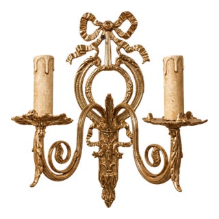 French-Style Two-Light Wall Sconce – Gilded Bronze & Gold Leaf With Bow and Scrollwork For Sale