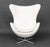 Fritz Hansen White Upholstered Egg Chair, label to seat. 31" H x 34" W x 27" D; seat: 14.5" H. Provenance: From a One...