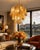 Italian vintage murano chandelier. The fixture is made up of 23 individual handblown tobacco glass elements hanging from a...