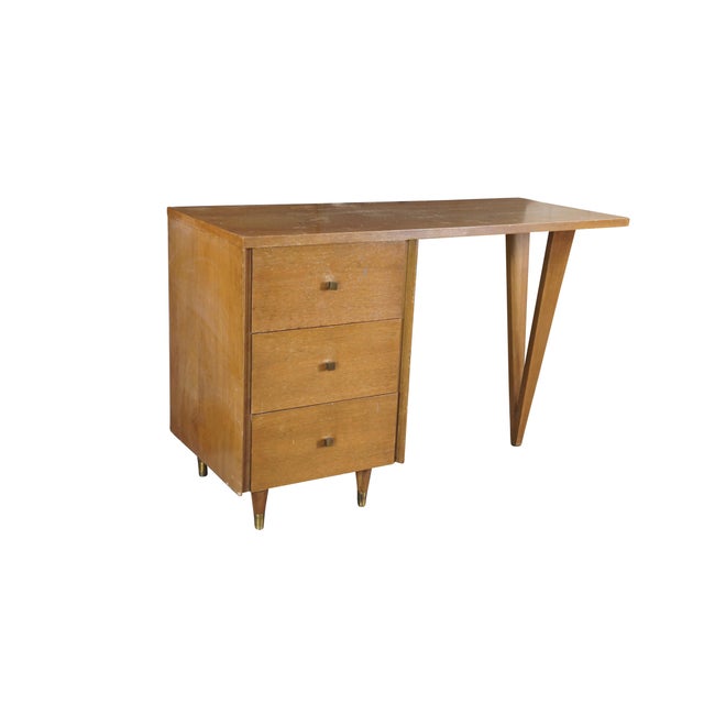 John Stuart Hairpin Desk, circa 1960s. Features a minimalist open form with plank top set between three dovetailed oak...