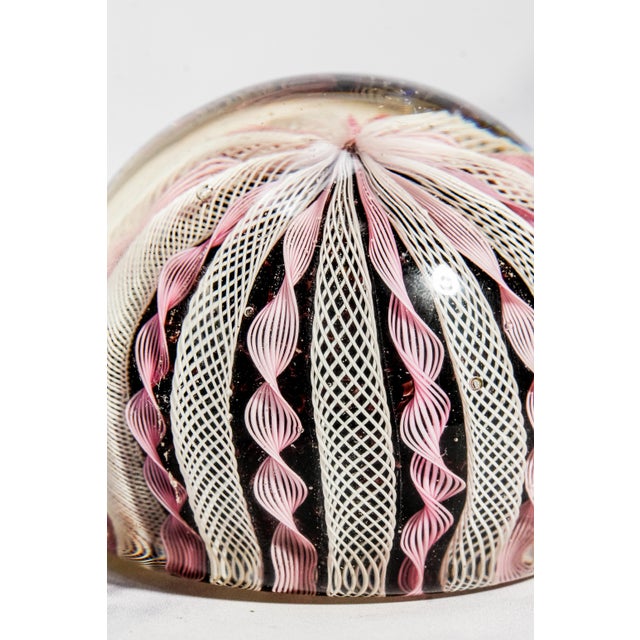 A beautiful example of mid-century Murano artistry, this hand-crafted Italian glass paperweight by Fratelli Toso showcases...