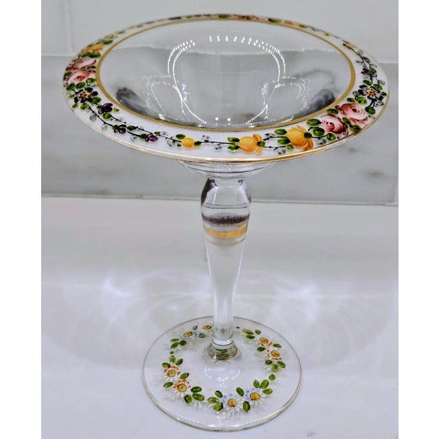 This antique Bohemian hand-painted glass compote tazza showcases classic Czech artistry, with a delicately flared bowl,...