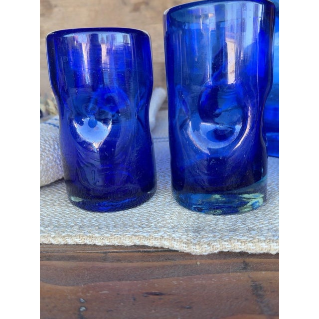 Vintage Spanish Revival Hand-Blown Seeded Cobalt Blue Pinched Dimple Glass Pitcher & Tumbler Set - 8 Pieces For Sale In Phoenix - Image 6 of 8